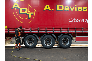 Tyre Technician at A Davies Transport using PCL's AIRFORCE MK4 Tyre Inflator to check and inflate HGV tyres from their fleet